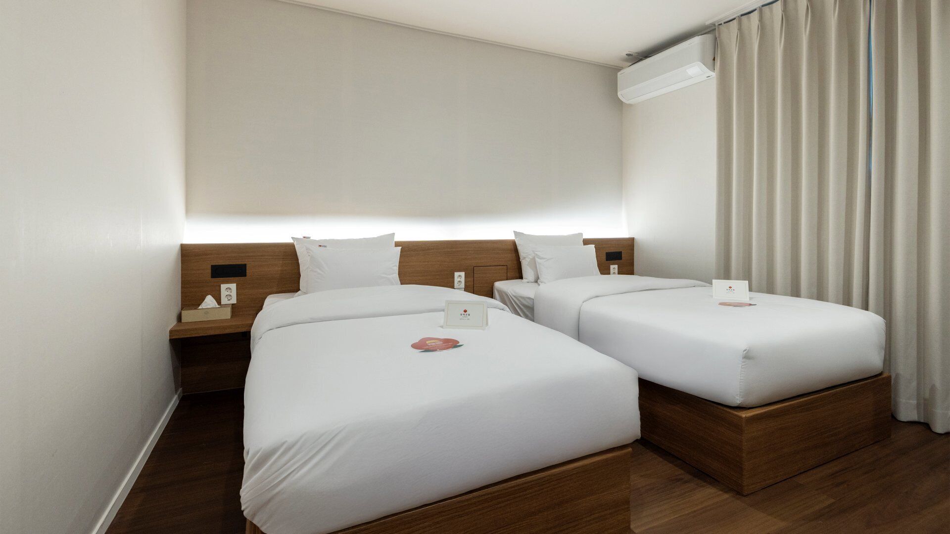 Premium bedding, individually furnished, blackout curtains