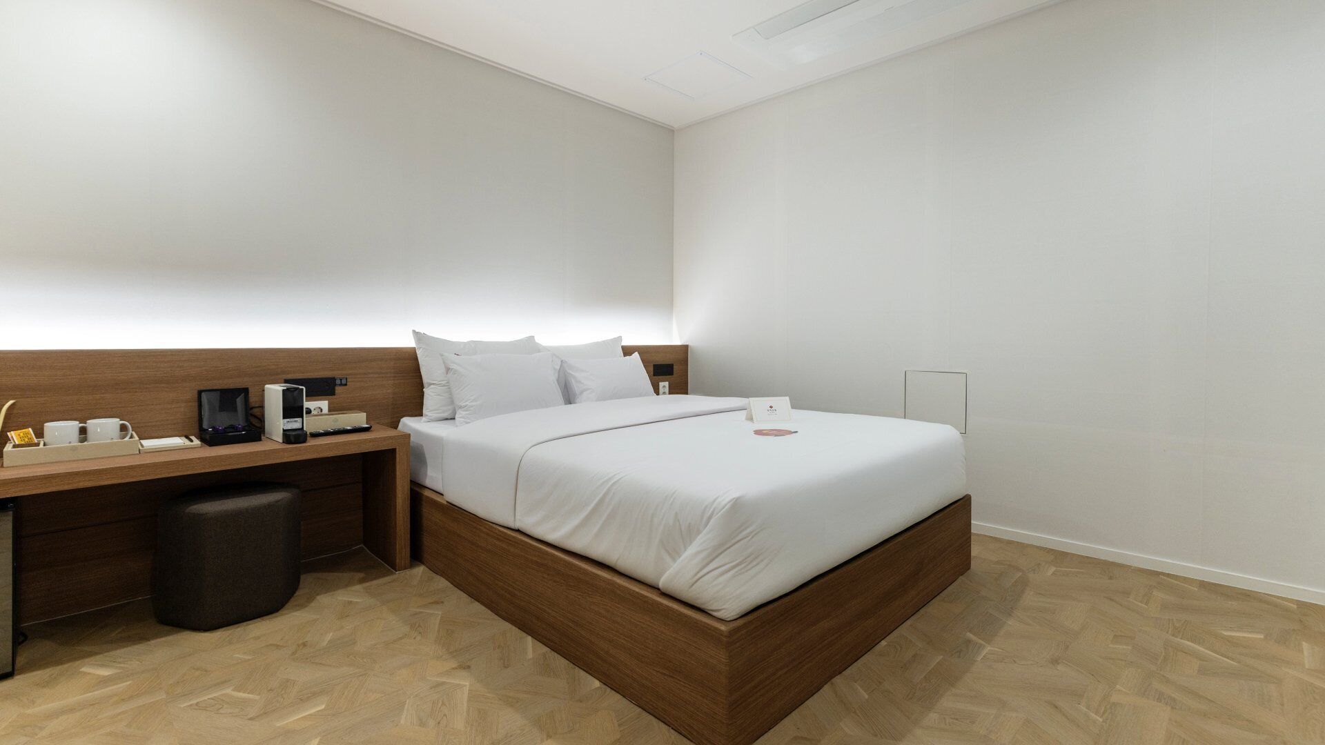 Premium bedding, individually furnished, blackout curtains