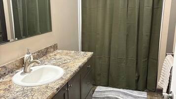 Jetted tub, hair dryer, towels, soap