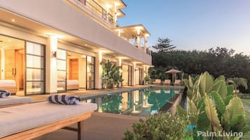 2 outdoor pools, pool umbrellas, pool loungers