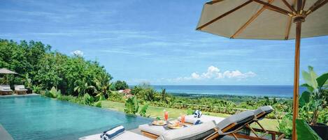 2 outdoor pools, pool umbrellas, sun loungers