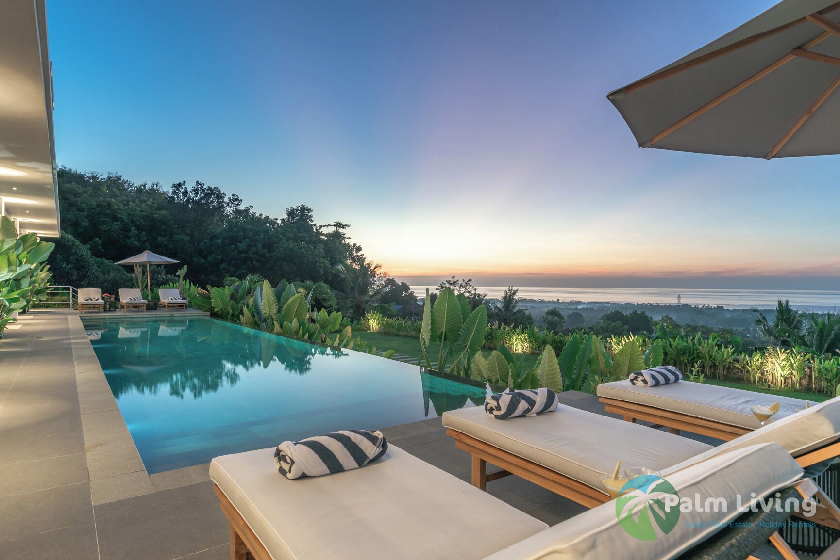 2 outdoor pools, pool umbrellas, pool loungers
