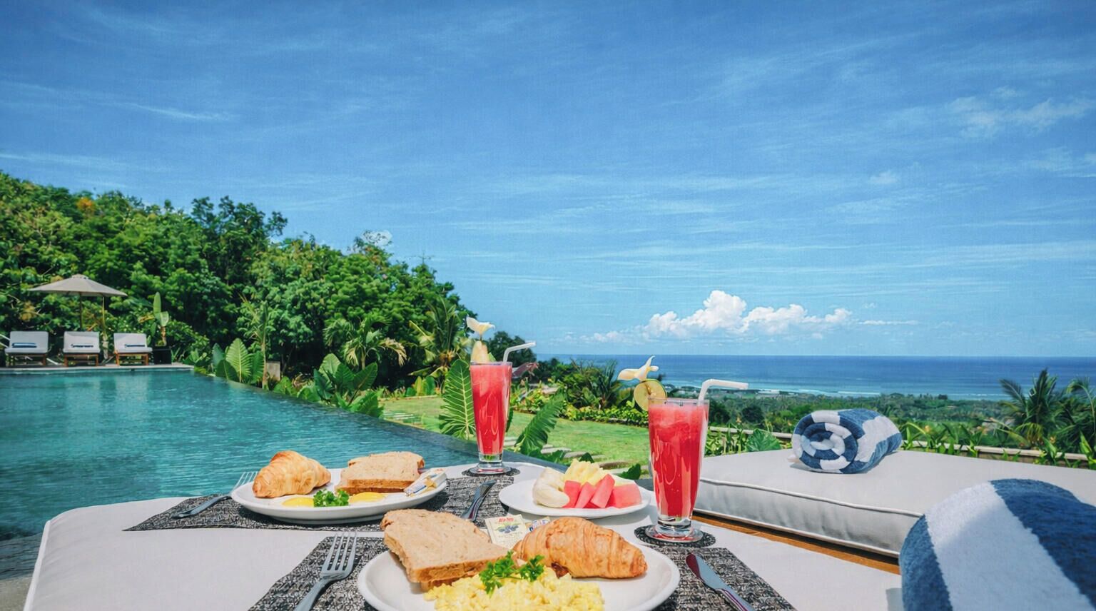 2 outdoor pools, pool umbrellas, pool loungers