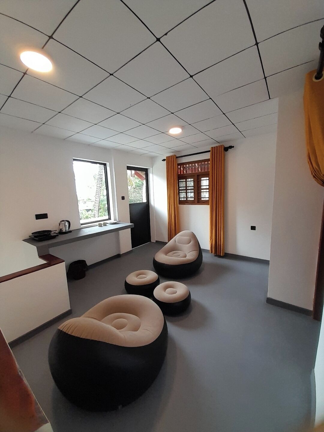 Suite Deluks, balkon, pemandangan kebun | Area keluarga