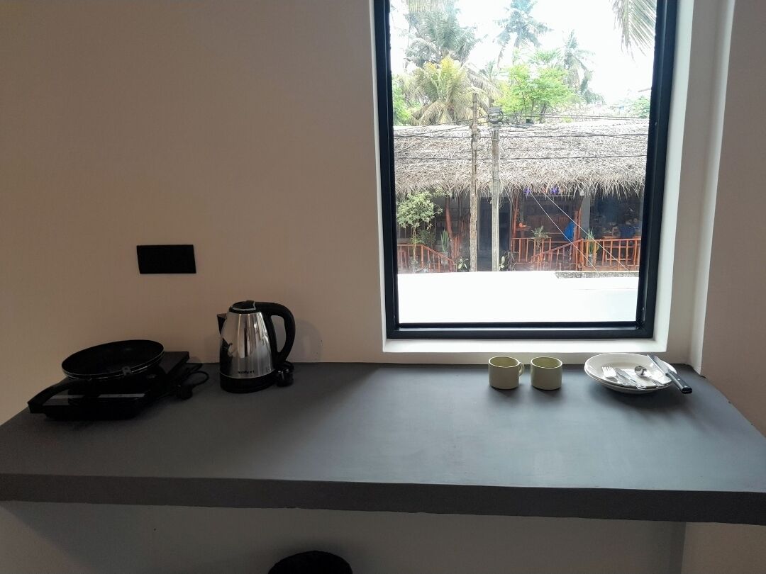 Deluxe Suite, Balcony, Garden View | Living area