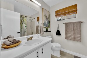 Shower, hair dryer, towels, soap