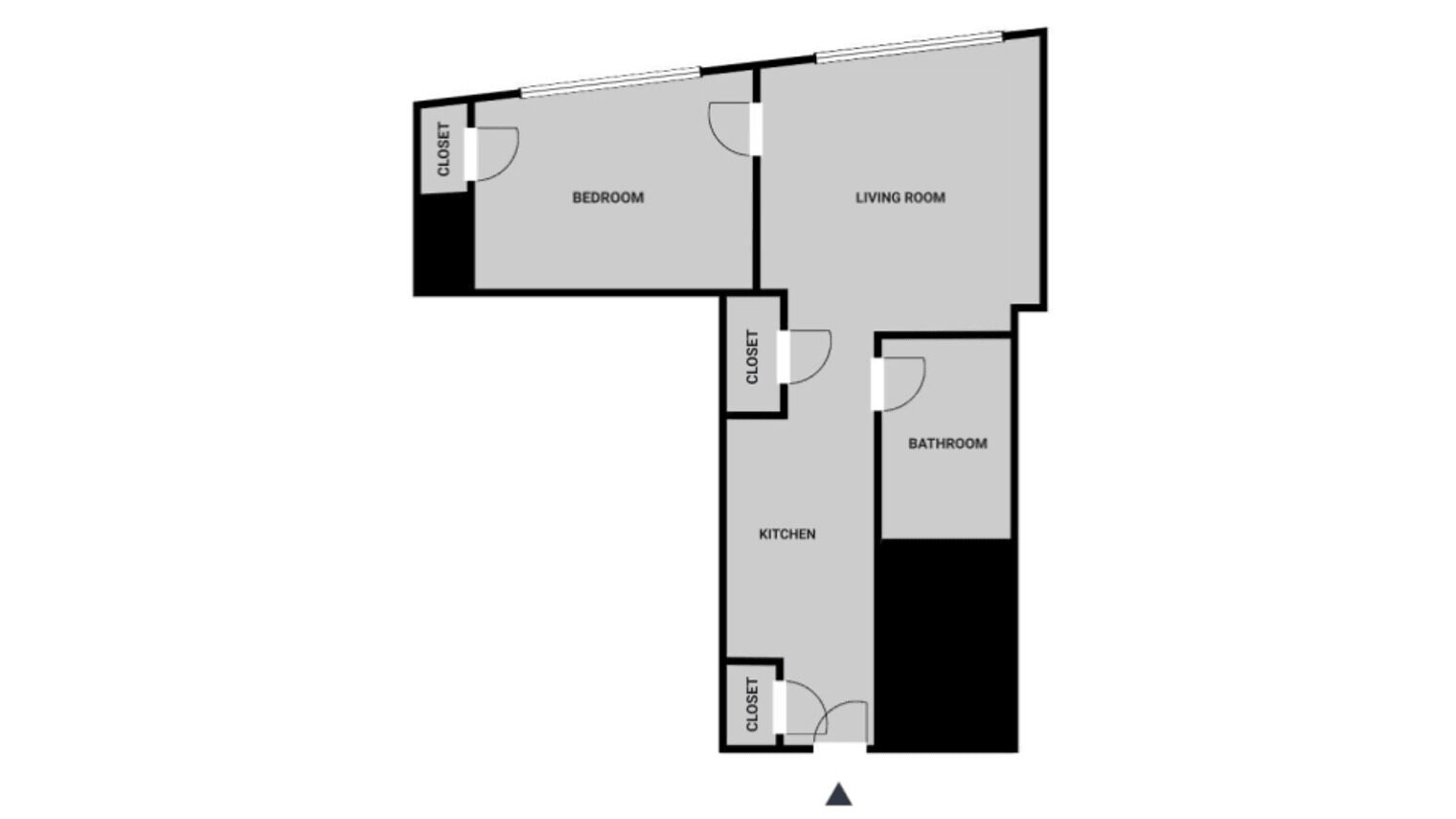 A floor plan with a bedroom, living room, kitchen, and bathroom.