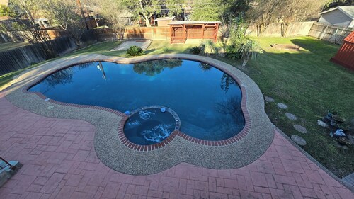 5BR Family Spring Getaway Home w/ Pool, EV Charger, Close to City Attractions