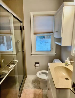 Shower, hair dryer, towels, soap