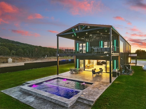 Lakefront resort home. Sleeps 26+! Boat dock, kayaks, pool, hot tub & more!