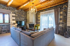 Living area - Ampelonas Vilana stone vila Nature-inspired retreat! (Koxare)