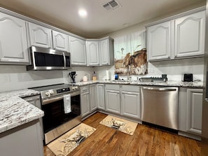 Fridge, microwave, oven, stovetop - Fun, entertaining home with game room near Fort Sill, restaurants, & shopping. (Lawton)