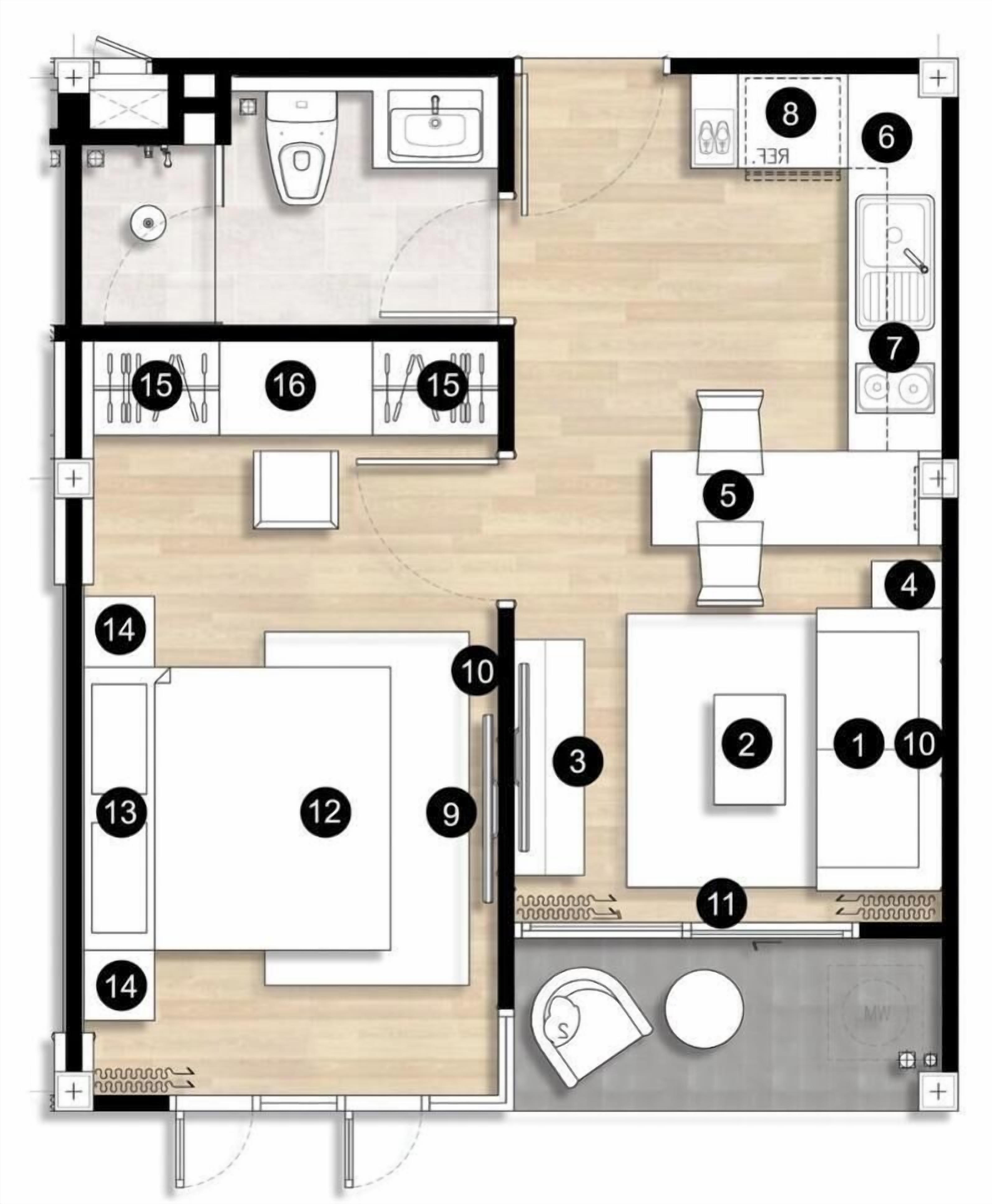 Un plan d’étage d’une chambre d’hôtel comprenant une salle de bain, un coin cuisine et un grand lit.