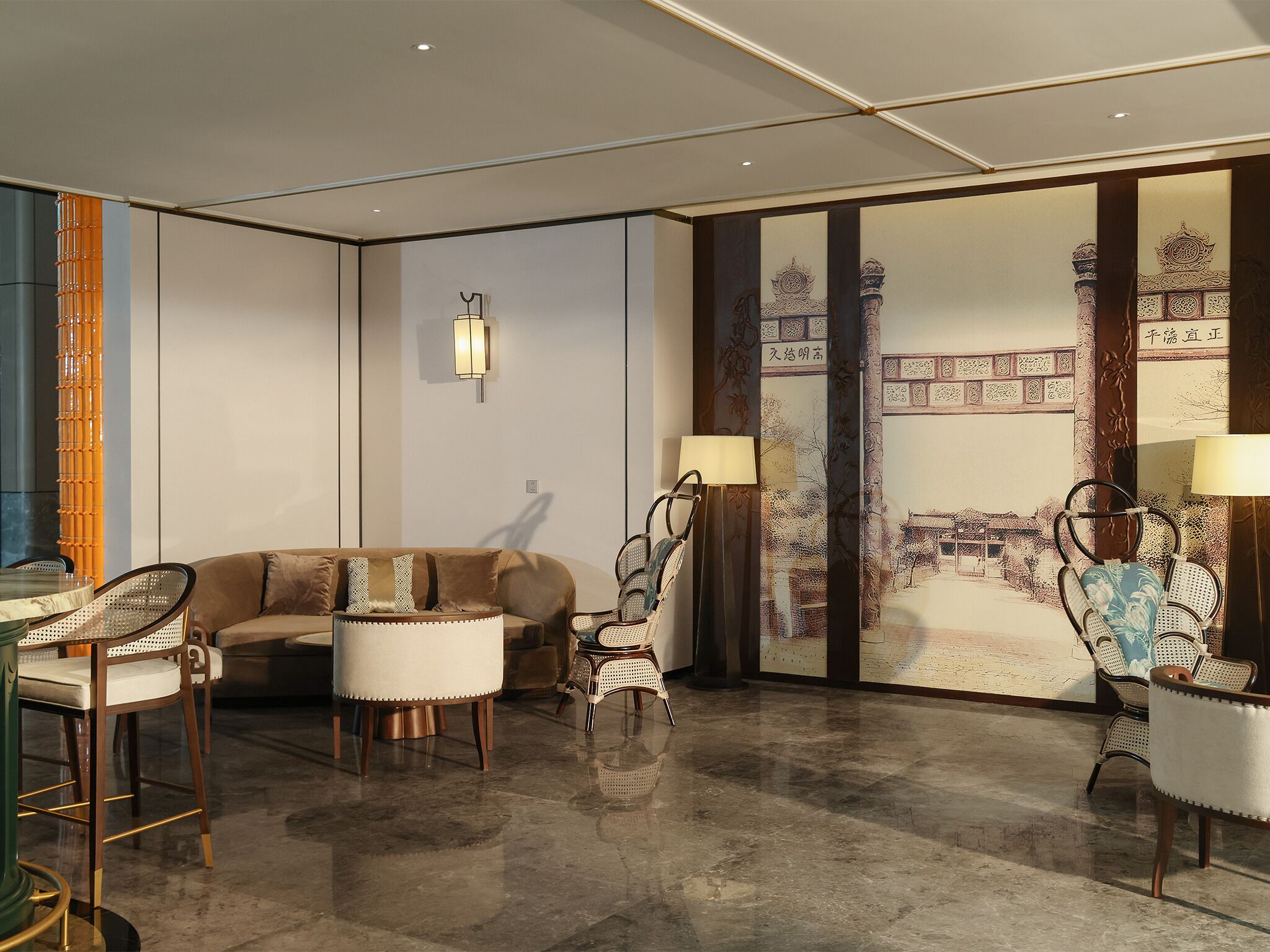 A modern living room with a sofa, two armchairs, a coffee table, and a decorative wall with traditional patterns.