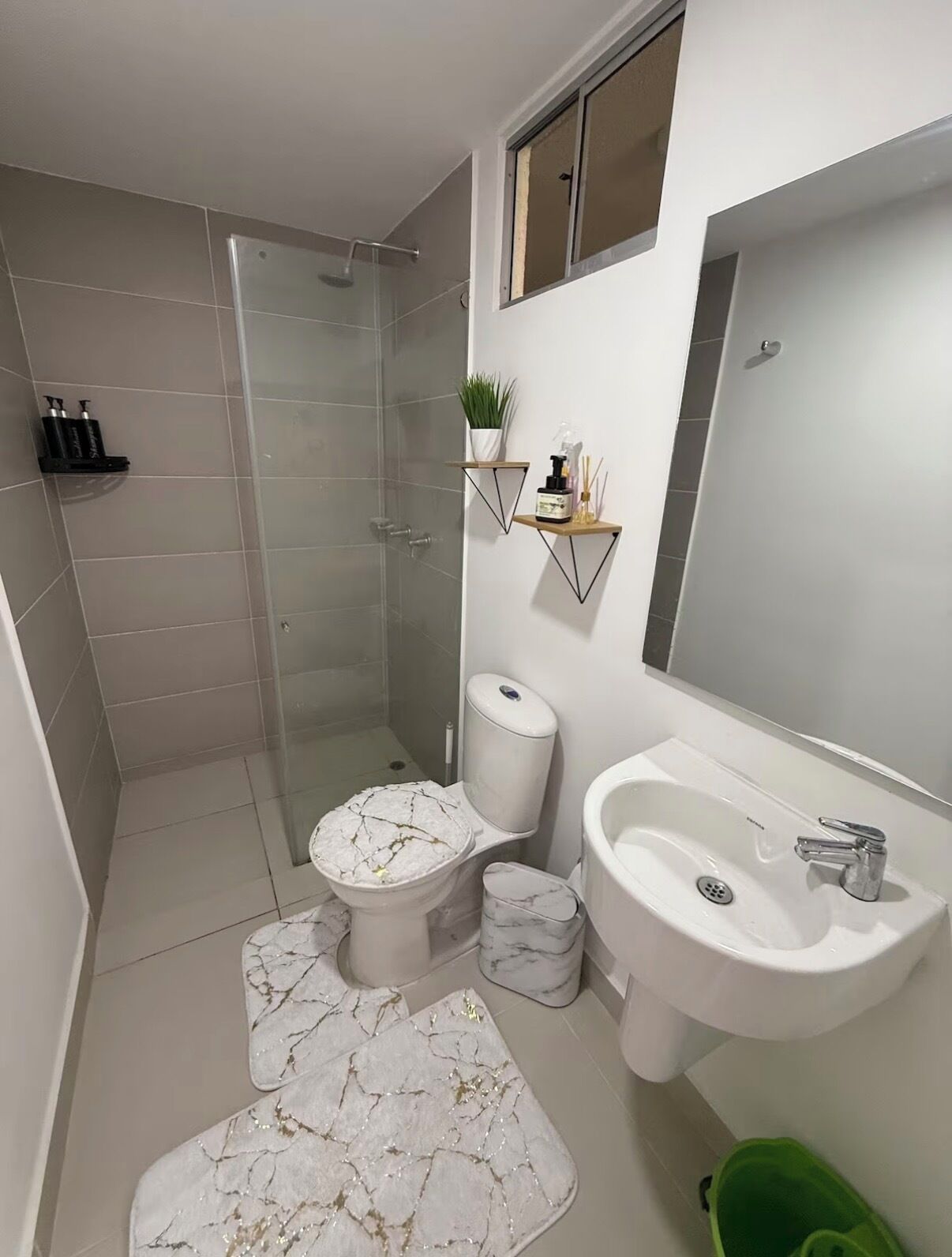 Shower, towels, soap, toilet paper