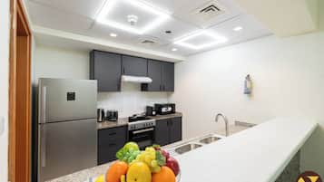 Appartement Luxe, balcon, vue jardin | Fer et planche à repasser, lits bébé (en supplément), Wi-Fi gratuit