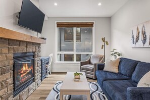 TV, fireplace - 1BR Canmore Charm. Balcony, Hot Tub Bliss Near DT (Canmore)