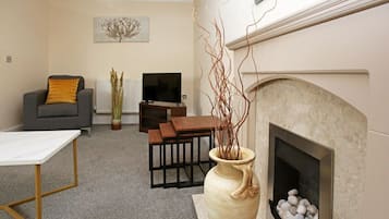 Executive Apartment | Living area | Flat-screen TV