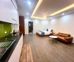 Studiosuite – deluxe, balkong, byutsikt | Innvendig