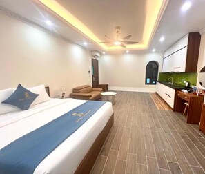 Deluxe Studio Suite, Balcony, City View | In-room safe, desk, laptop workspace, blackout curtains - Royal Louis Hotel (Dai Mo)