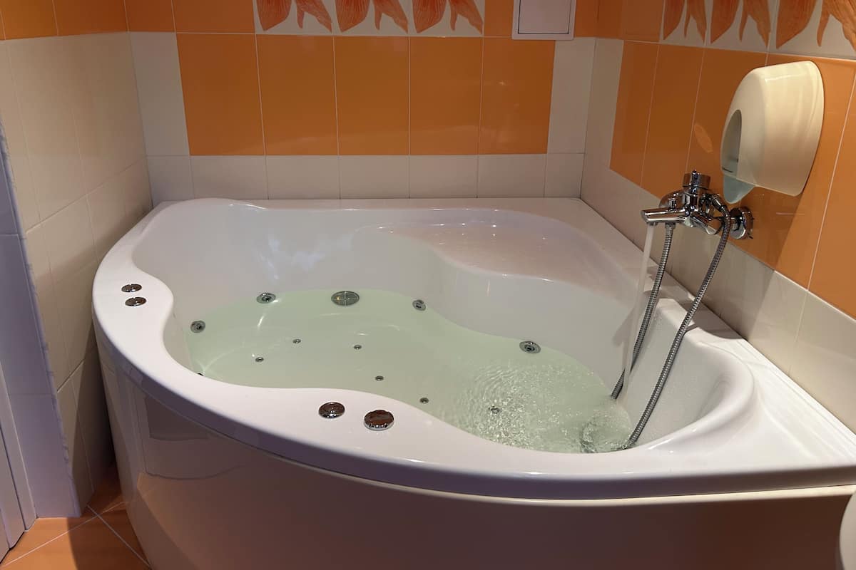 Luxury Double Room, Jetted Tub | Bathroom | Free toiletries, hair dryer, towels, soap