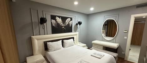 Departamento Deluxe, 3 habitaciones, vista al mar | Escritorio, espacio para trabajar con laptop y wifi gratis