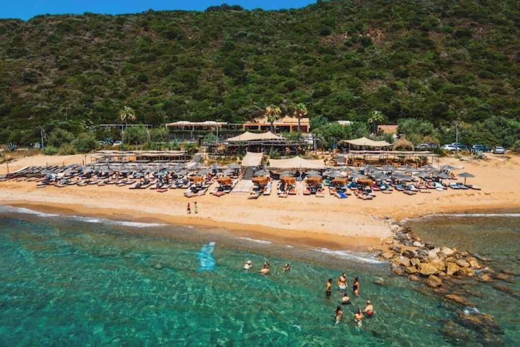On the beach, sun loungers, beach towels