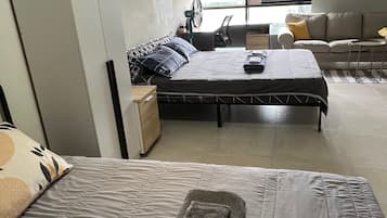 Family Studio, Kitchenette, Garden View | Minibar, individually decorated, individually furnished, desk