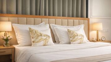 Elite Retreat | Desk, bed sheets
