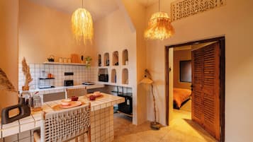 Luxury Apartment, Garden View | Private kitchen | Mini-fridge, microwave, oven, stovetop