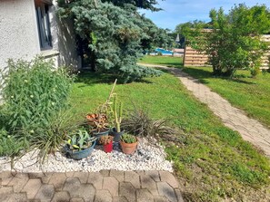 Double Room, Balcony, Garden View | Terrace/patio - La maison du Bonheur (Saint-Bernard)