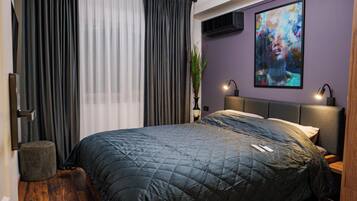 Una cassaforte in camera, ferro/asse da stiro, culla da viaggio