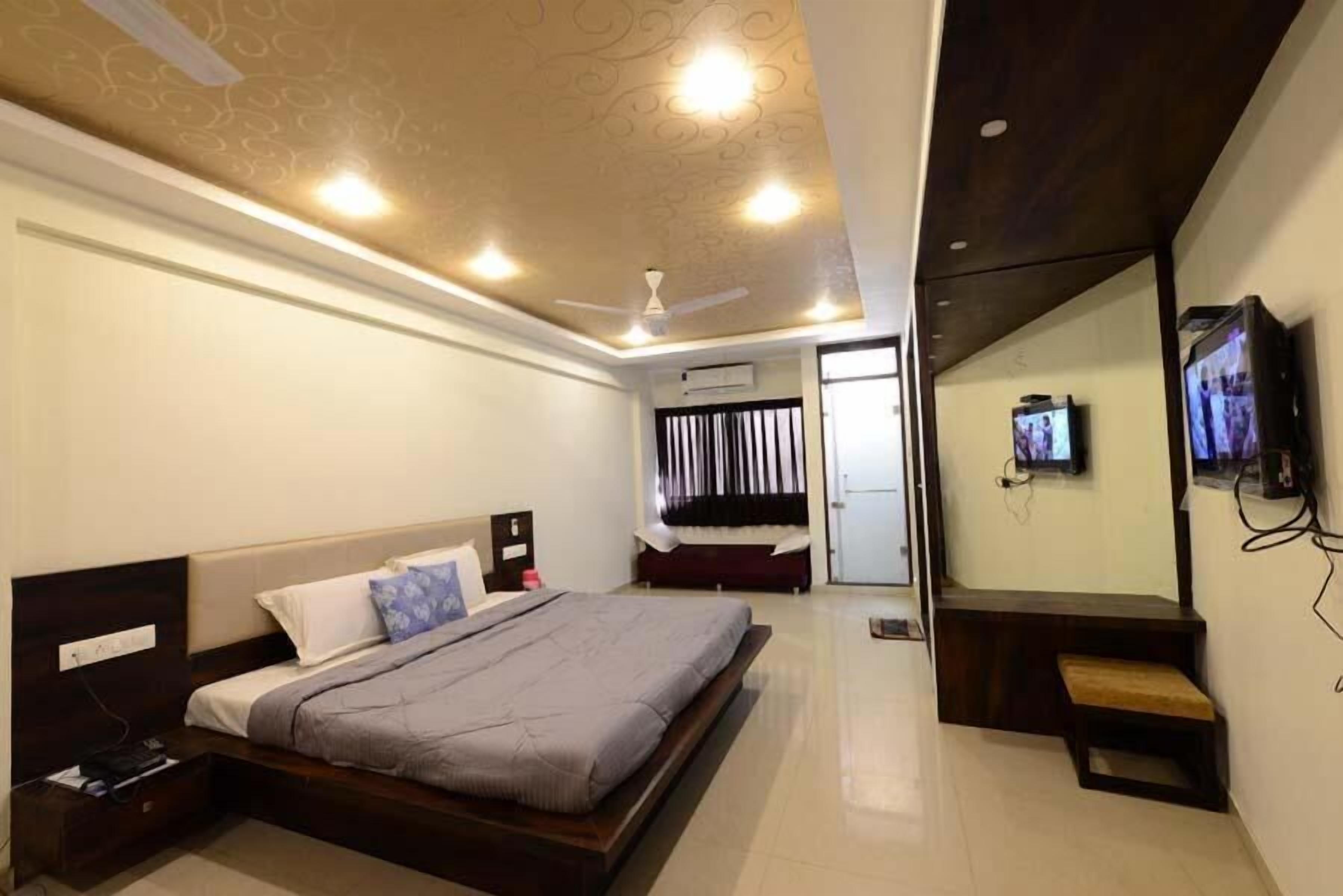 ห้องดีลักซ์ | ผ้าปูที่นอนฝ้ายอียิปต์, เครื่องนอนระดับพรีเมียม, เตียงเมมโมรีโฟม