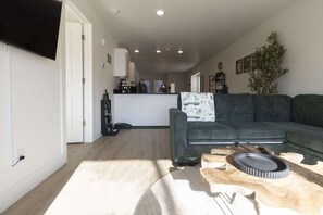 TV, fireplace - Branson Modern Luxury Haven •Heated Pool •Stylish 2BR •Walk to Branson Landing (Branson)