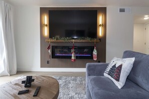 TV, fireplace - Creekside Comfort | Renovated 2BR Condo • Pools • Near Branson Landing (Branson)