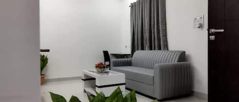 Departamento, 1 habitación, balcón | Área de sala de estar