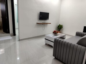 Apartamento, 1 quarto, sacada | Área de estar