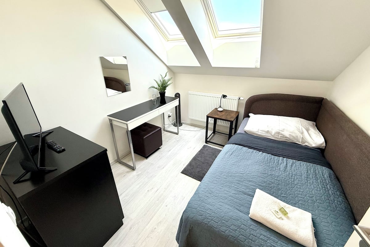 Quarto solteiro conforto | Wi-Fi de cortesia