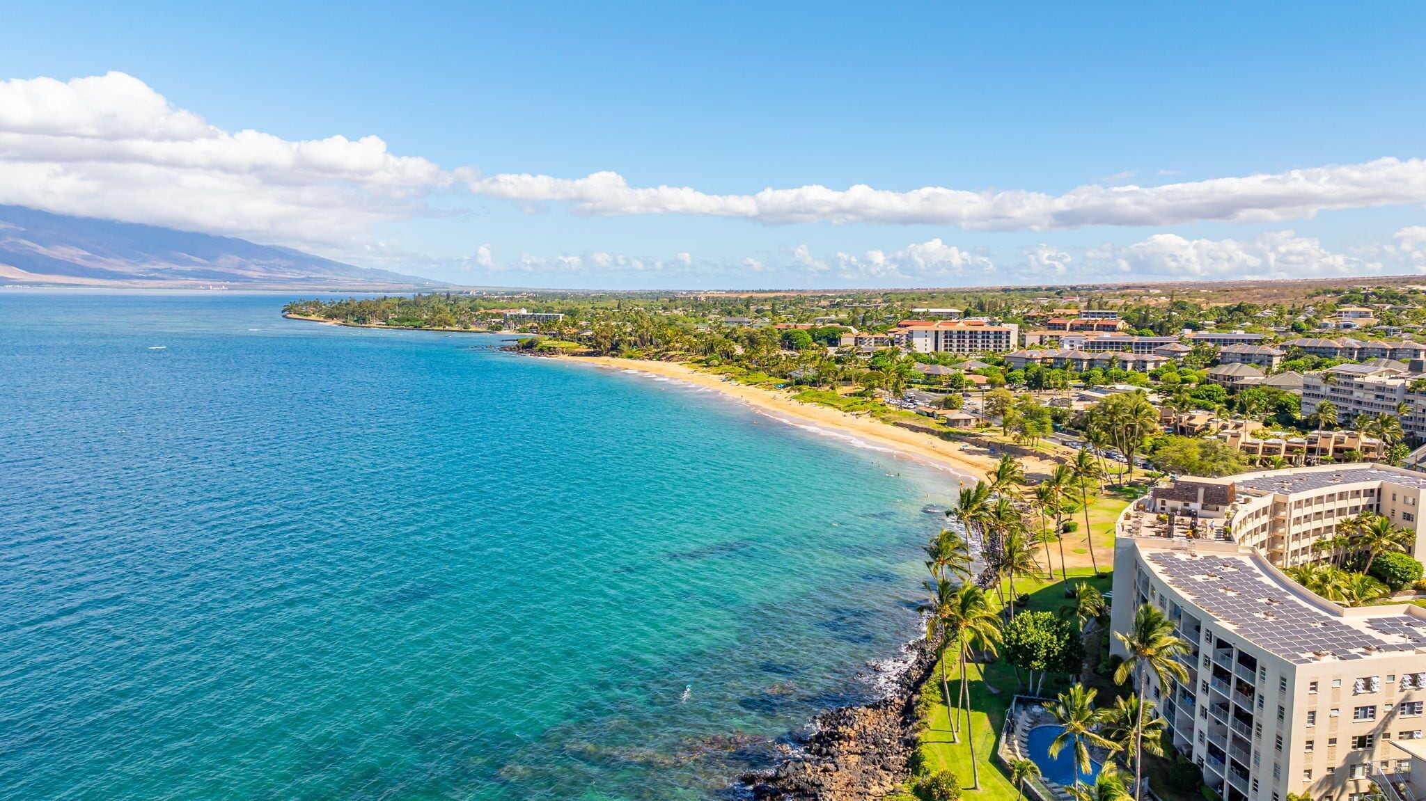On the beach, sun loungers, beach towels