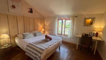 Desk, laptop workspace, blackout curtains, free WiFi