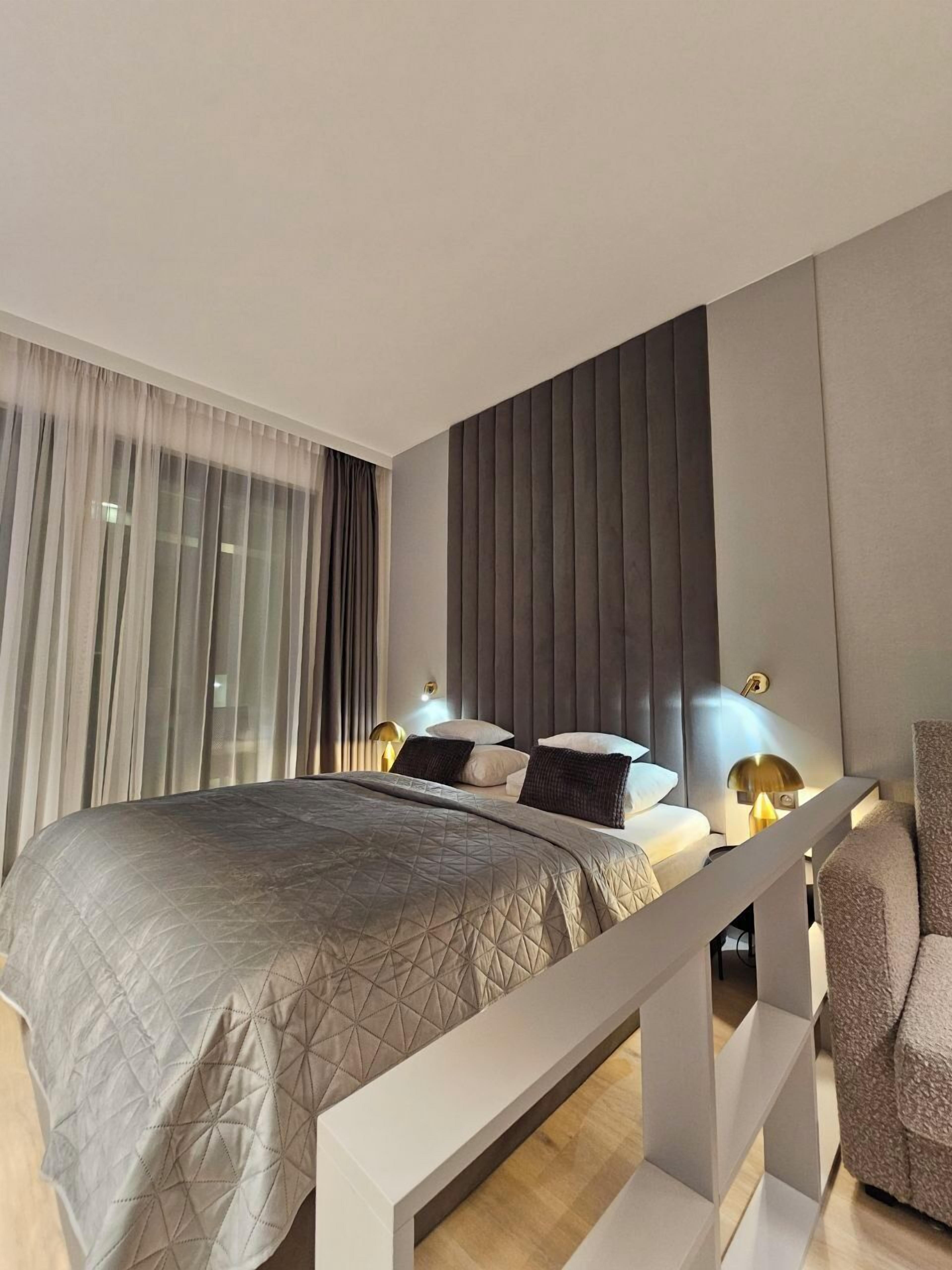 Estudio Deluxe, 1 habitación, para no fumadores, vista a la ciudad | Área de sala de estar