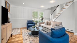TV, fireplace, offices - Falmouth Family Home: Beach, Fire Pit & Games! (Falmouth)