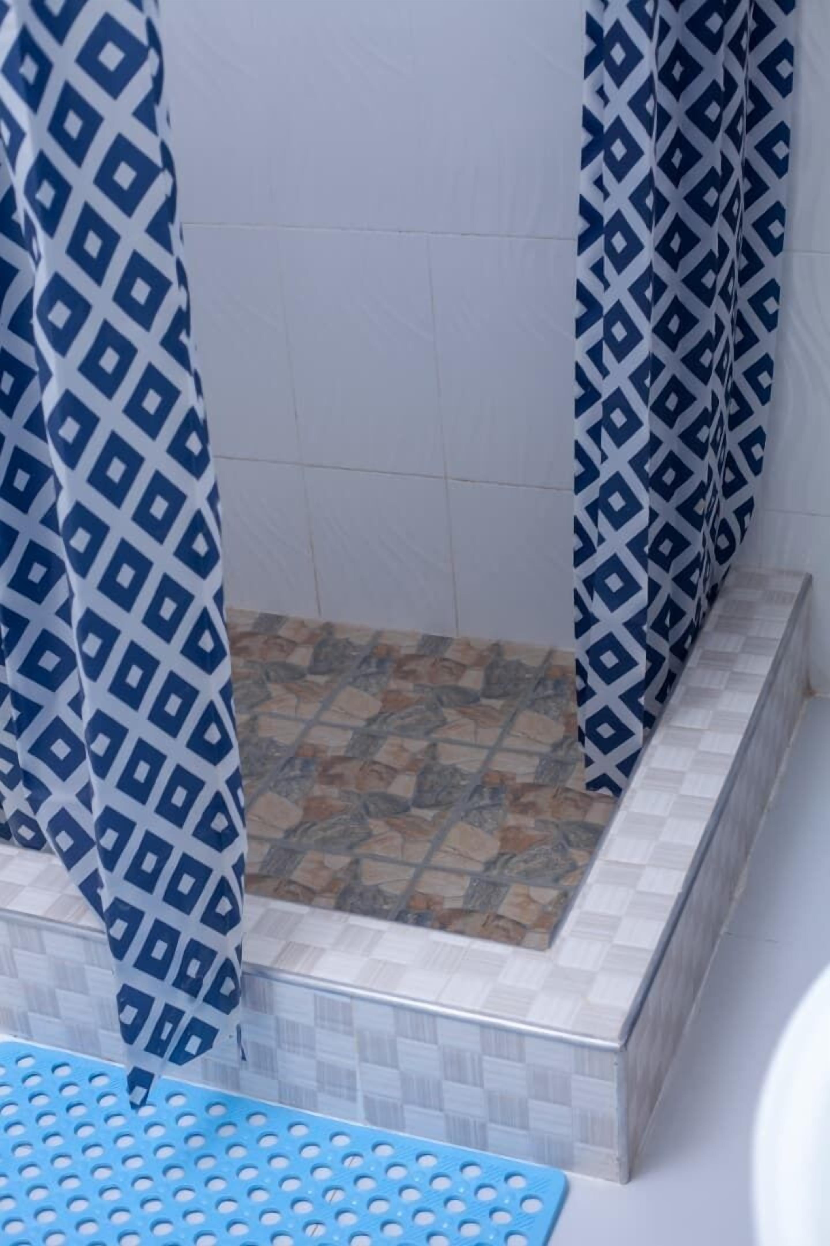 Comfort Apartment, Patio, Garden View | Bathroom | Shower, free toiletries, hair dryer, slippers