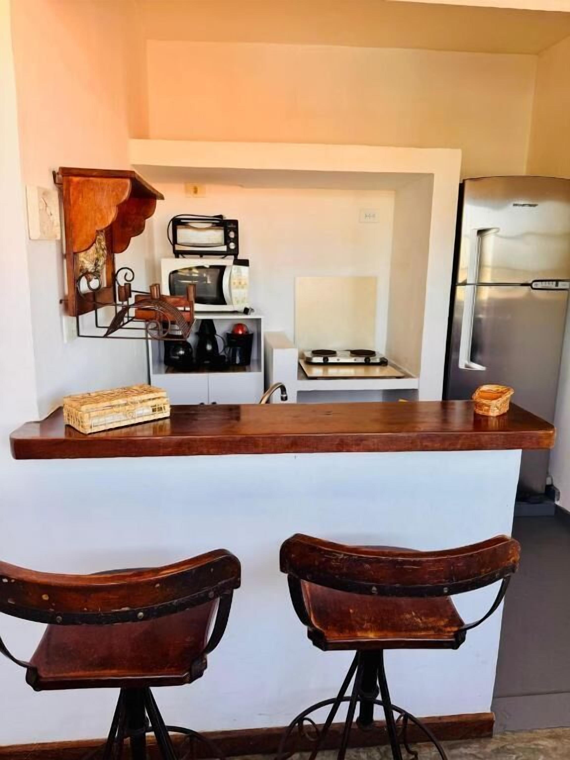 Habitación cuádruple familiar, vistas al mar | Cocina privada