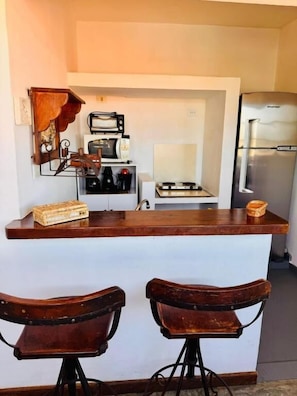 Habitación cuádruple familiar, vistas al mar | Cocina privada