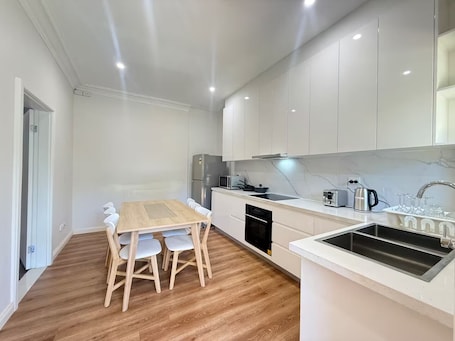 Private kitchen. Entire Warm Home At Bankstown.
