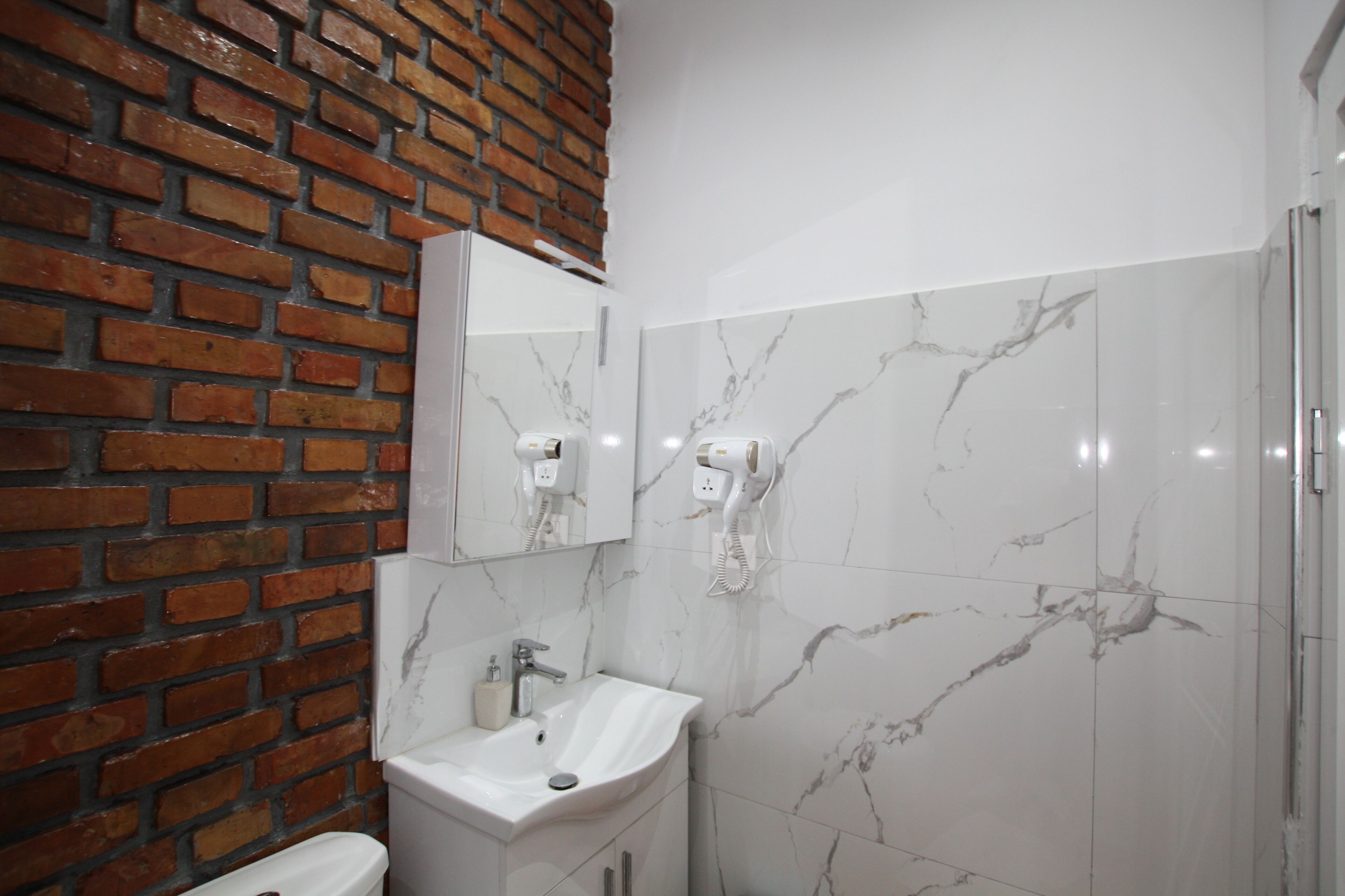 Twin Room, Mountain View | Bathroom | Bathrobes