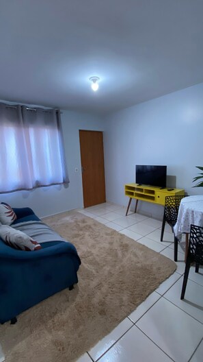 Living area - Comfortable apartment, well located and with great value for money in Rio Verde. (Rio Verde)