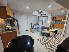 Condo, 2 Bedrooms, Accessible | Living room - Casa Rosa2 2BR Loft in BGC With 55" Smart TV & 5 pax (Taguig)