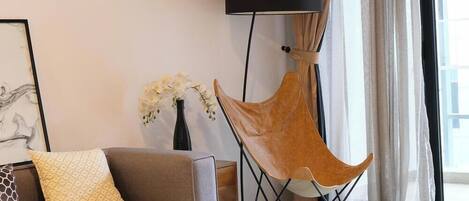 Deluxe Apartment, 2 Bedrooms, Pool Access, City View | Living area | Flat-screen TV